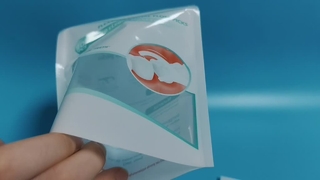 O fio dental escolhe o volume hermético sanitário do saco do zíper para marcas dos cuidados orais