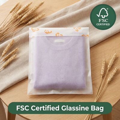 Saco de papel de vidro de luxo sustentável para roupas plástico livre de biodegradabilidade embalagem de roupas saco de roupas para venda a granel certificada